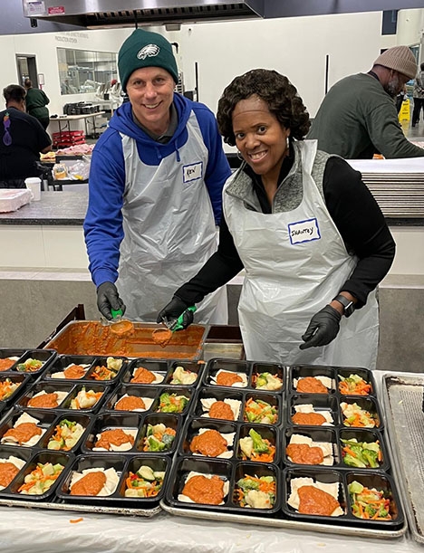 PennCU CEO Ken Stone and General Manager Shantey Frierson volunteered at Philabundance Community Kitchen